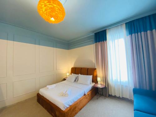 Postel nebo postele na pokoji v ubytování Mose art Hotel