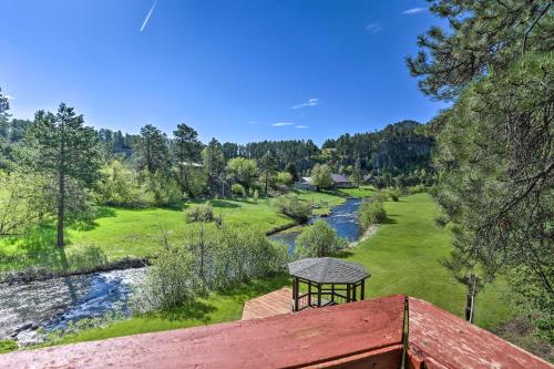 a view from the roof of a house with a river at Creekside Rapid City Cabin with Deck on 30 Acres! in Rapid City