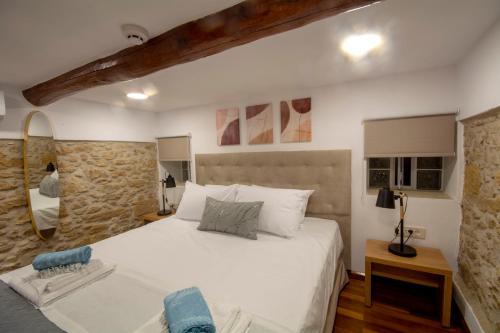 Ένα ή περισσότερα κρεβάτια σε δωμάτιο στο Casa Christina-Luxury Villa