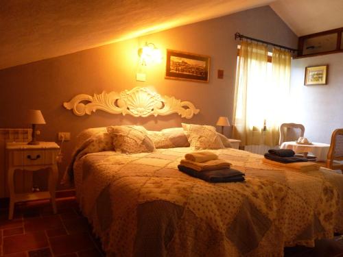 Posteľ alebo postele v izbe v ubytovaní B&B The Roses Garden