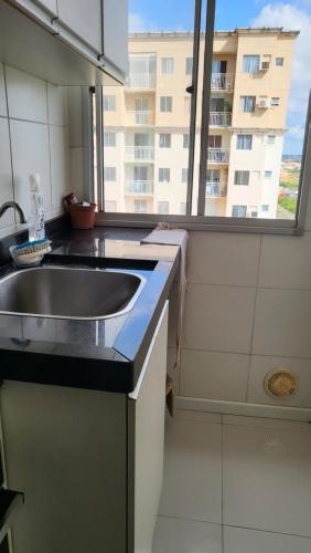 Kuchyň nebo kuchyňský kout v ubytování APARTAMENTO CONFORTÁVEL A 900 MTS DA PRAIA DO ARAÇAGY