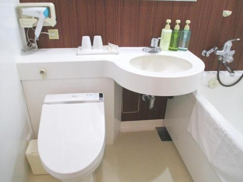 a bathroom with a toilet and a sink at Pulsesin in Kyoto - Vacation STAY 73556v in Kyoto