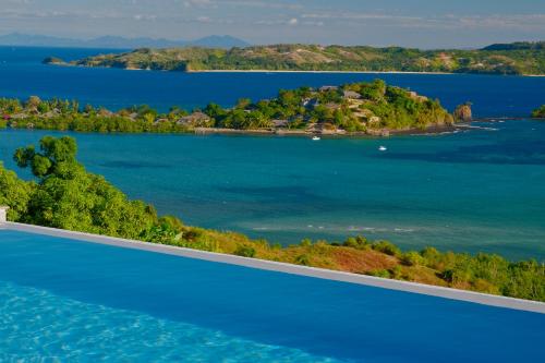an island in the middle of a body of water at VILLA DOMINGO - Incroyable vue panoramique in Andilana