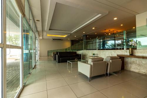 Ruang duduk di Happy Hotel Manaíra
