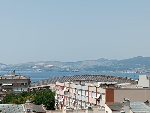 a view of a city with a stadium in the background at Apartments Ivan & Luka in Split