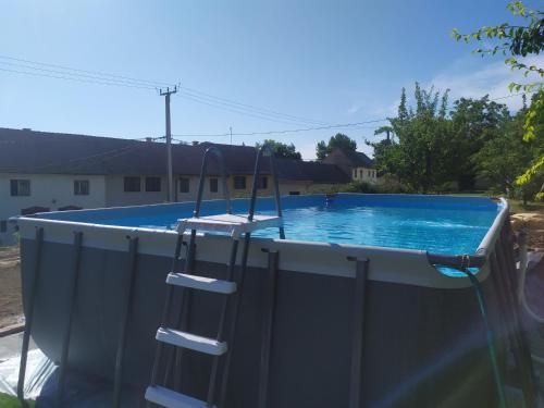 The swimming pool at or close to Neidhardt Vendégház