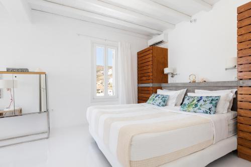 Ein Bett oder Betten in einem Zimmer der Unterkunft Villa Iliada