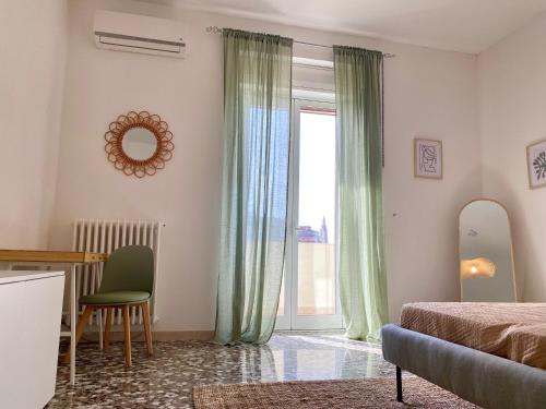 En eller flere senger på et rom på La Vue est Belle - Puglia Mia Apartments