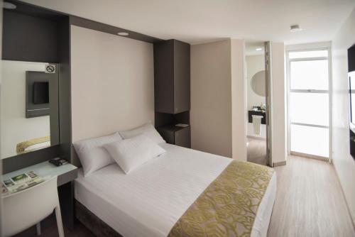 Voodi või voodid majutusasutuse Eco Star Hotel toas