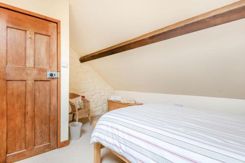 Postel nebo postele na pokoji v ubytování Tryfan Cottage