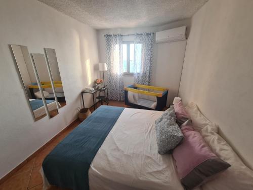A bed or beds in a room at Filumare