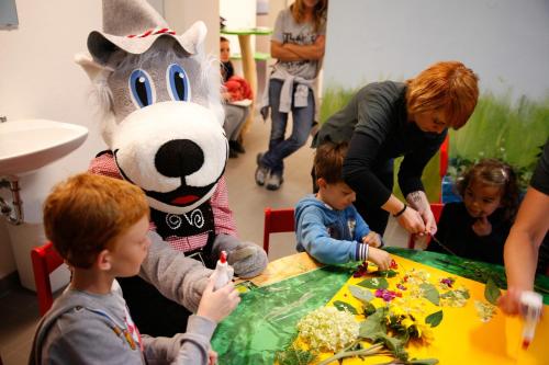 a group of children in a bunny costume sitting at a table at Sonnenhotel Bayerischer Hof - All Inklusive Angebote verfügbar in Waldmünchen
