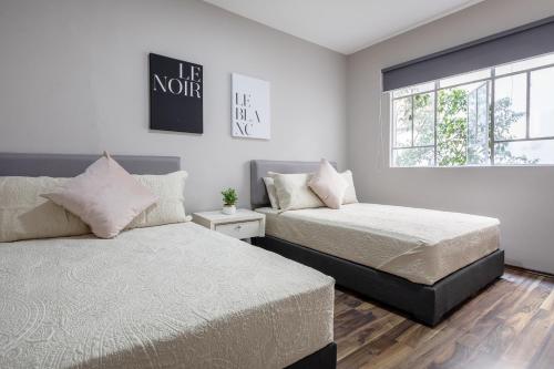 Krevet ili kreveti u jedinici u objektu Enjoy Condesa - Roma At Fully Equipped 2br Apartment Near Reforma