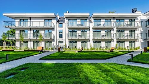 Taman di luar e-baltic - Niechorze, Your beachfront apartments,