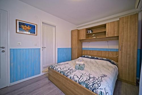 Ένα ή περισσότερα κρεβάτια σε δωμάτιο στο Guest House Matana Pomena