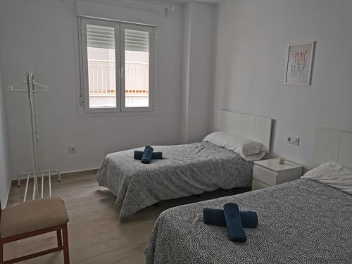 Posteľ alebo postele v izbe v ubytovaní Precioso piso céntrico recién reformado