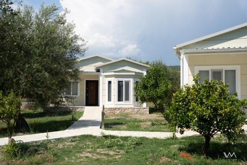 Κήπος έξω από το Oikies Verde