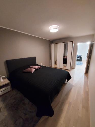 Postel nebo postele na pokoji v ubytování Vee 2 apartement