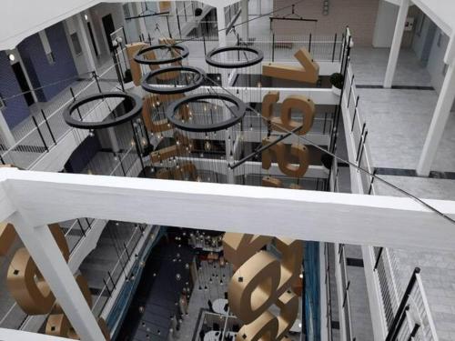 arial view of a building with tables and chairs at Lapinniemen kattohuoneistot Tampereella in Tampere