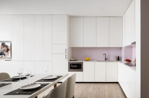 Kuchyň nebo kuchyňský kout v ubytování Citadines Flatiron Phnom Penh