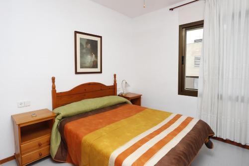 Posteľ alebo postele v izbe v ubytovaní AT025 Con piscina, airco, a 150m de la playa