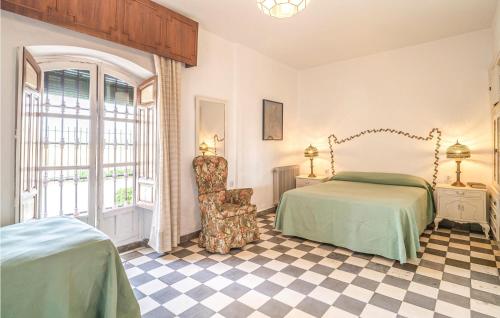 Ένα ή περισσότερα κρεβάτια σε δωμάτιο στο Nice Home In Tocon With Wifi