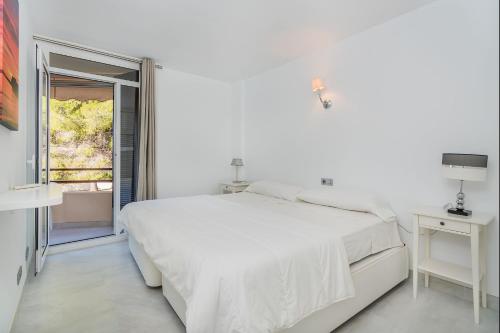 Voodi või voodid majutusasutuse Apartment Lord Jim By SunVillas Mallorca toas