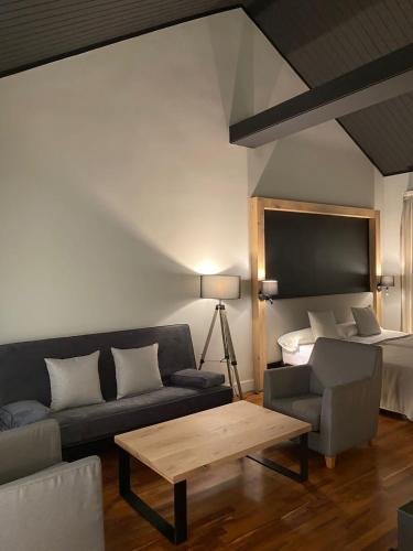 Гостиная зона в Hotel Xalet del Golf