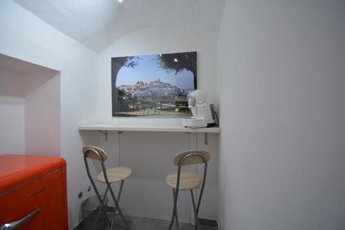 TV a/nebo společenská místnost v ubytování A Casa di Giò