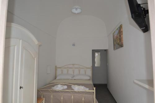 Postel nebo postele na pokoji v ubytování A Casa di Giò