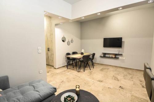 Μια τηλεόραση ή/και κέντρο ψυχαγωγίας στο GM Apartment