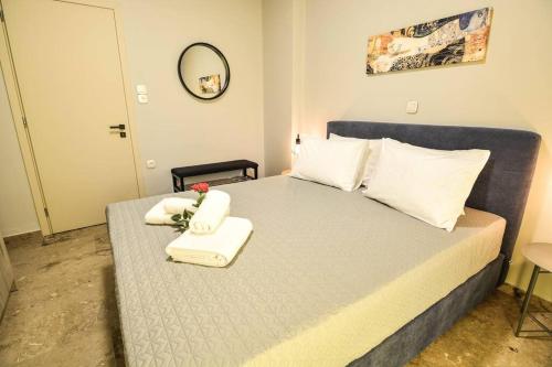 Ένα ή περισσότερα κρεβάτια σε δωμάτιο στο GM Apartment