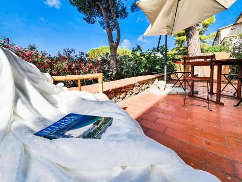 Fotografie z fotogalerie ubytování Trilocale La Pineta Quiet garden v destinaci San Mamiliano