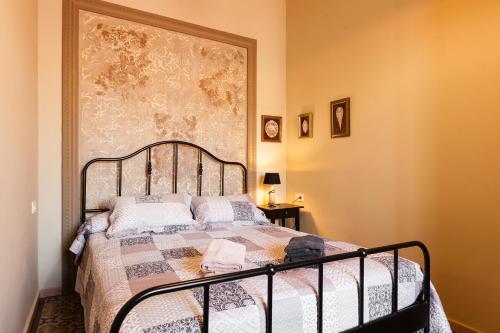 Ένα ή περισσότερα κρεβάτια σε δωμάτιο στο Apartament Xarello