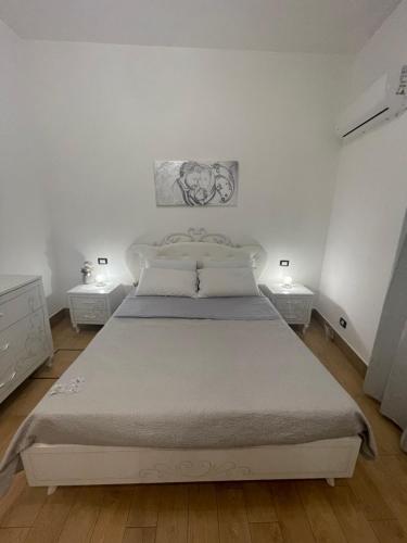 Voodi või voodid majutusasutuse Casa vacanze Miceli toas
