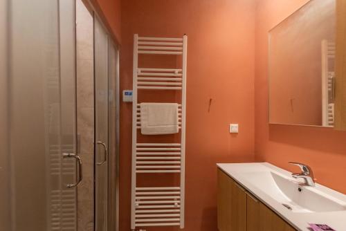 a bathroom with a shower and a sink at Tinas Home - Kalamata Mediterranean Villas in Kalamata