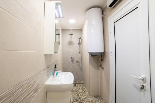 Ванная комната в Апартамент за гости Русе Център-Придунавска (Дунав)