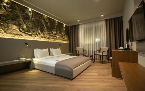 Postelja oz. postelje v sobi nastanitve The Erzurum Hotel