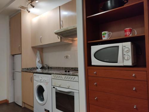 Η κουζίνα ή μικρή κουζίνα στο Apartamento Gloria en Oviedo