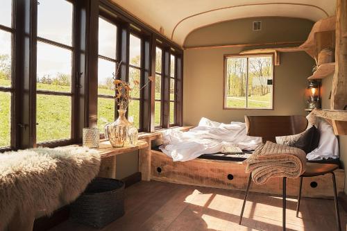 Кровать или кровати в номере Krusmølle Glamping