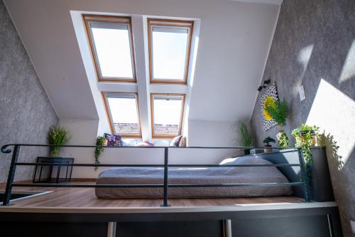 Letto o letti in una camera di Palms Apartments Budapest