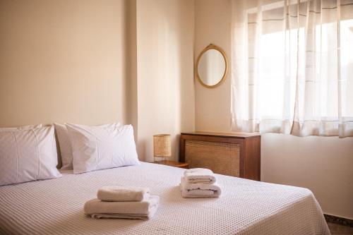 Postel nebo postele na pokoji v ubytování Casa Armonia Seaside