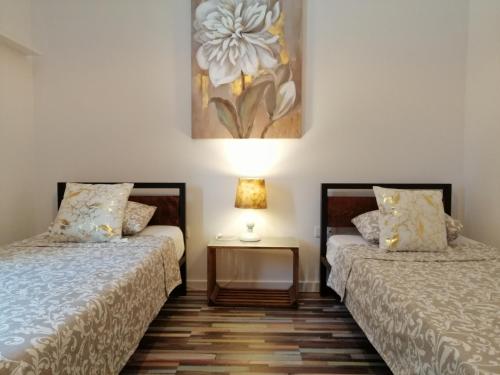 Postel nebo postele na pokoji v ubytování Apartment Rita