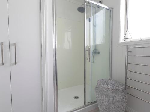 Ванна кімната в The Clearwater Cottage - Te Anau Holiday Home