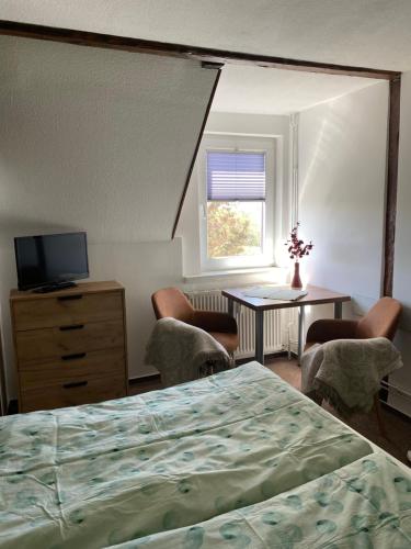 Ein Bett oder Betten in einem Zimmer der Unterkunft Haus Mohnke