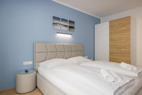 Postel nebo postele na pokoji v ubytování Yourapartment Theresien