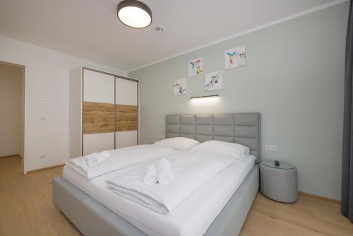 Postel nebo postele na pokoji v ubytování Yourapartment Theresien