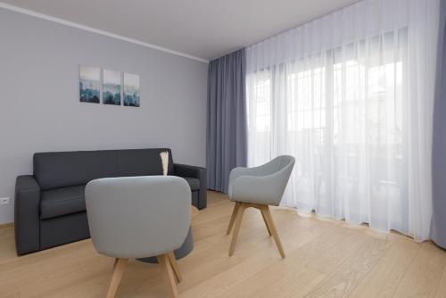 Posezení v ubytování Yourapartment Theresien