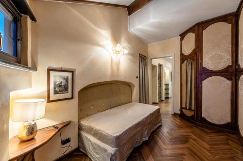 Cama o camas de una habitación en Dimora Lucrezia