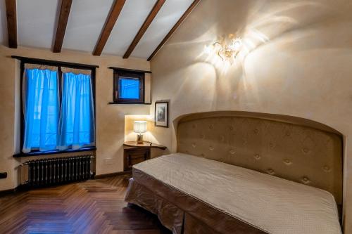 Cama o camas de una habitación en Dimora Lucrezia